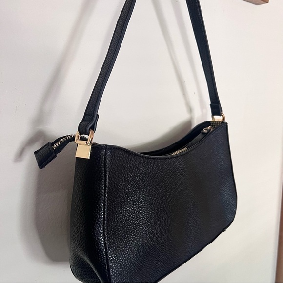 Previously owned Nanette Lepore Handbag in Black with Gold Hardware - Picture 5 of 13